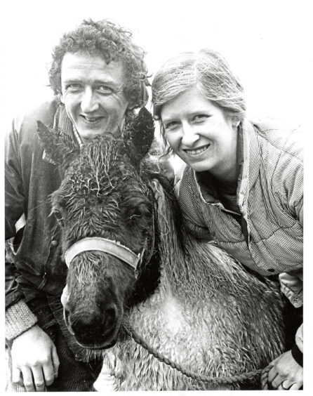 1988 - Gordon Barbour and his wife Fiona give rescued pony Lucky a welcome to their farm.