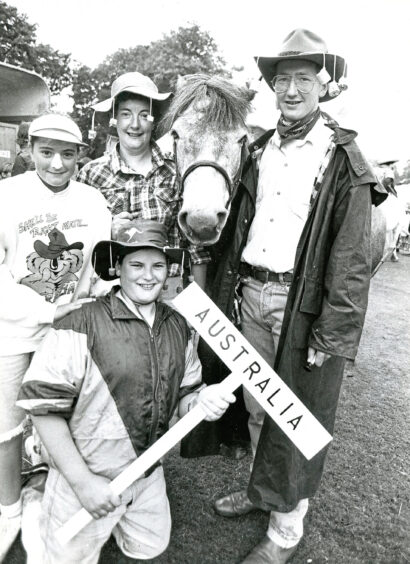 1990 - Neil, Susan and Anne Groat with John Reid dressed in Australian costumes at the Highland Pony Show.