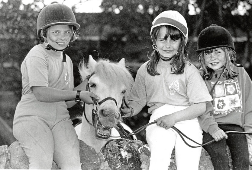 1993 - Sugarlump the Welsh pony, joins young horse lovers, from Lucy Morgan, 9, Kathryn Sim, 8, and Jennifer Minor, 9, who raised money for a horse sanctuary in Aboyne.