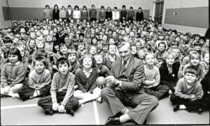 1987 - Royal National Institute for the Blind appeals organiser Stanley Flett with Primary 1 and 2 after a social education talk.