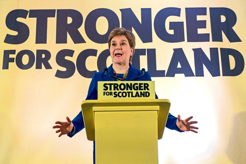 Nicola Sturgeon during a speech standing in front of a Stronger For Scotland Indyref2 banner