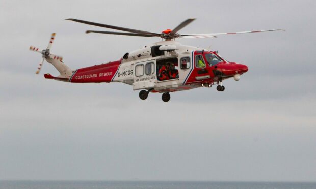 Coastguard helicopter in the sky