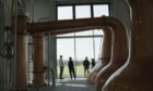 Scottish group Admiral Fallow first met overseas artists Madeleine Roger and Yu Tsan Pin for the first time when they visited the distillery as construction neared completion. Image: Muckle Media.