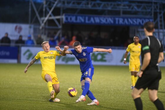 Cove Rangers midfielder Charlie Gilmour takes aim against Morton. Image: Chris Sumner/DC Thomson