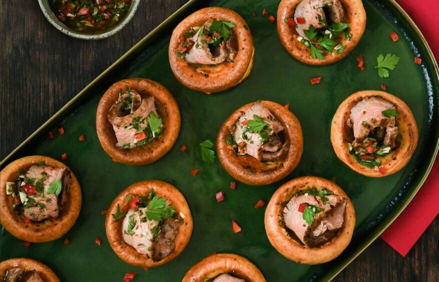 Scotch beef popovers in a chimichurri sauce