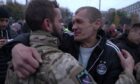 The sight of the man wearing the Aberdeen FC jacket in Kherson surprised many viewers. Image: BBC News