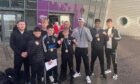 The delighted Inverness City ABC boxers and coaches following their success at the Scottish Development Championships at Ravenscraig. Image: Inverness City ABC