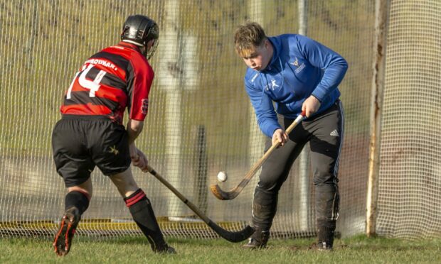 Skye keeper Murphy Henderson in action against Glenurquhart. Images: Neil Paterson