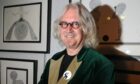 Billy Connolly in front of his exhibition at the Aberdeen Art Fair in the Music Hall on Union Street in 2012. Image: DC Thomson.
