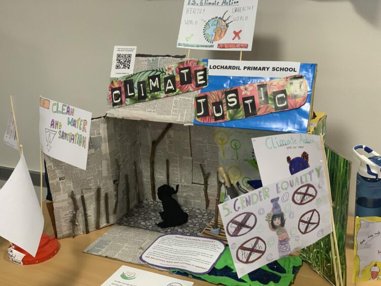 Lochardil Primary pupils created an art installation to advocate for climate justice. Photo by Garrett Stell/DC Thomson