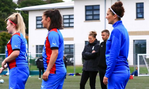 Caley Thistle manager Karen Mason watches on during her team's pre-match warm-up. Image: Donald Cameron/SportPix for SWF
