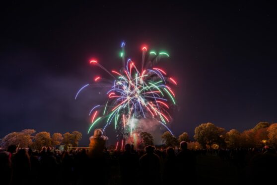 The firework display has been postponed amid a yellow weather warning.