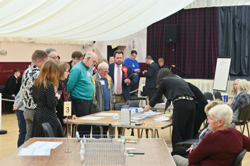 Candidates and agents watching on as the Buckie by-election count takes place. Image: Jason Hedges/DC Thomson