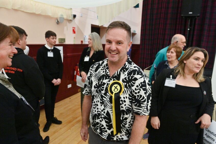 Moray Council leader Kathleen Robertson congrats SNP John Stuart on becoming a councillor.
Image: Jason Hedges/DC Thomson
