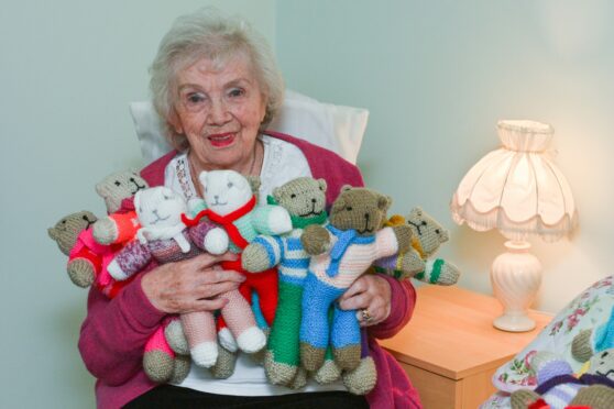 Elgin grandmother Joyce Wilson with her teddy bears she knits for charity