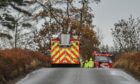 Emergency services at the scene of a fatal three-car crash near Nairn. Image: DC Thomson.