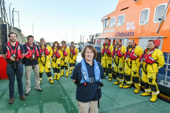 Anne Scott with her lifeboat colleagues at the RNLI station in Buckie