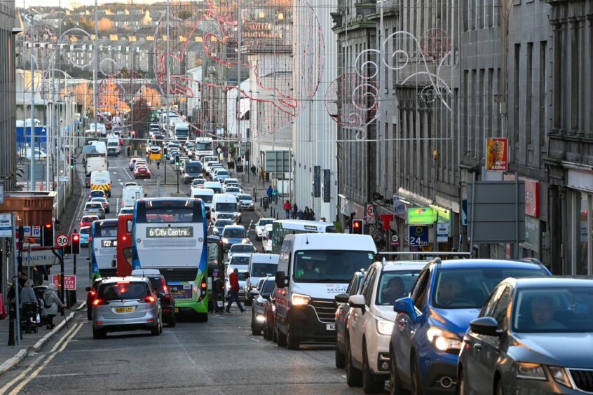 The upper stretch of Aberdeen's Market Street with traffic queued.