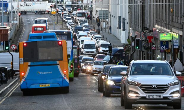 Traffic on Market Street. Aberdeen City Councillors have been advised against establishing a council-run bus service. Image: Kenny Elrick/DC Thomson.