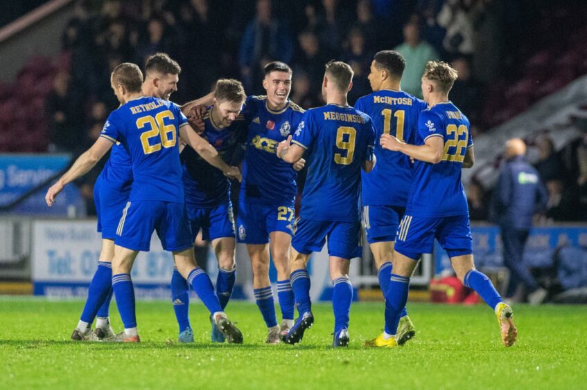 Cove Rangers players congratulate Blair Yule after his late leveller. Image: Kami Thomson/DC Thomson