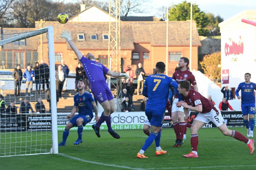 Cove Rangers striker Gerry McDonagh watches on as his header comes back off the Arbroath crossbar. Image: Kami Thomson/DC Thomson