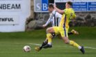 Fraserburgh's Scott Barbour, left, tries to get away from Buckie's Sam Pugh