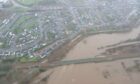 Aerial footage taken by Network Rail Scotland show the scale of the damage caused between Kintore and Dyce after the river Don burst its banks. Image: Network Rail Scotland.