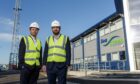 PD&MS chief executive Simon Rio, left, and Thomas Barter, right, head of renewables business development, outside the Seagreen offshore wind farm base at Montrose Port. Image: Big Partnership