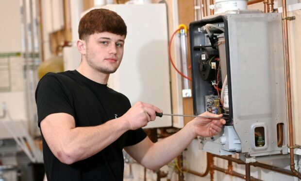 Apprentice plumber Kayne Forsyth training for the UK SkillPlumb Finals next week. Image: Darrell Benns / DC Thomson