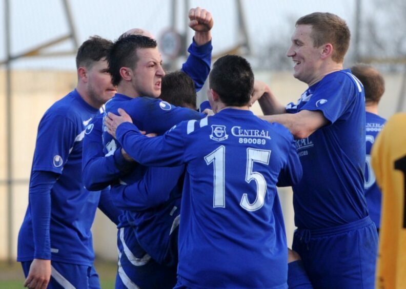 Connor Scully is congratulated after scoring on his Cove Rangers debut in March 2012. Image: Kenny Elrick/DC Thomson