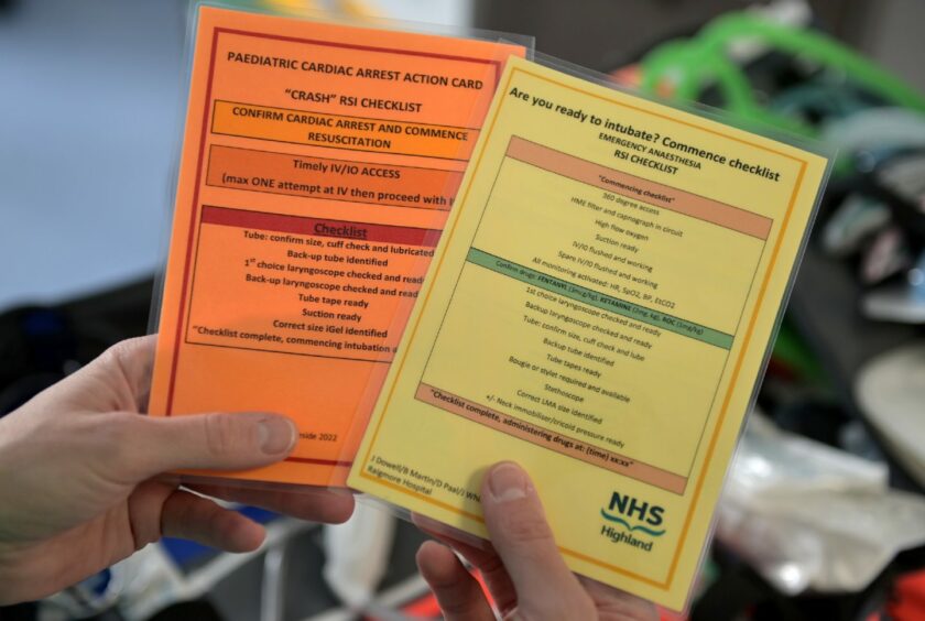 There's checklists in the bag to aid in the treatment of seriously ill children.