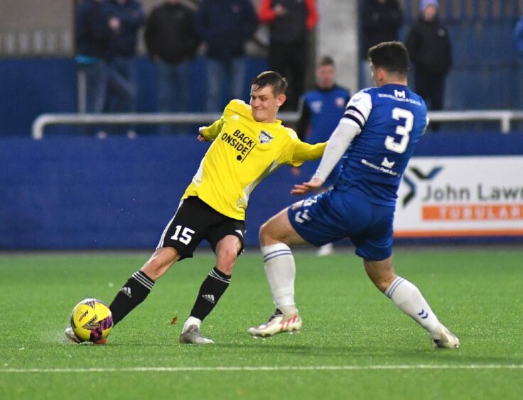 Peterhead defender Danny Strachan in action against Montrose. Image: Duncan Brown