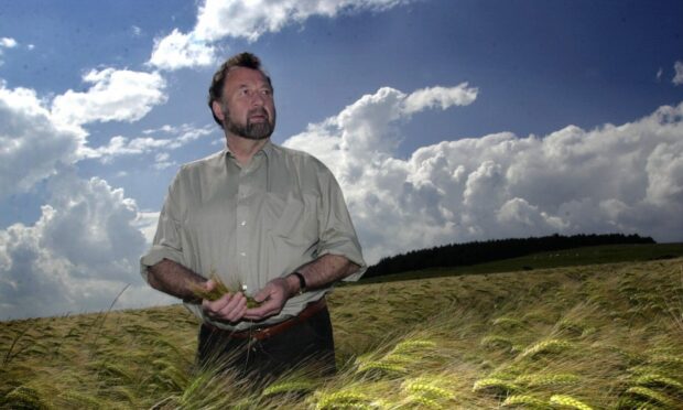 Allan Smith among the barley on his farm near Ellon. Image by Kevin Emslie.