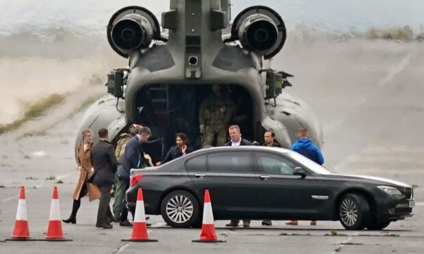 Home Secretary Suella Braverman arrives in a Chinook helicopter for a visit to the Manston immigration centre in Kent. Picture: Gareth Fuller/PA Wire.