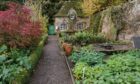 The potager and mixed border at Kellie Castle's 19th Century Arts and Crafts garden.