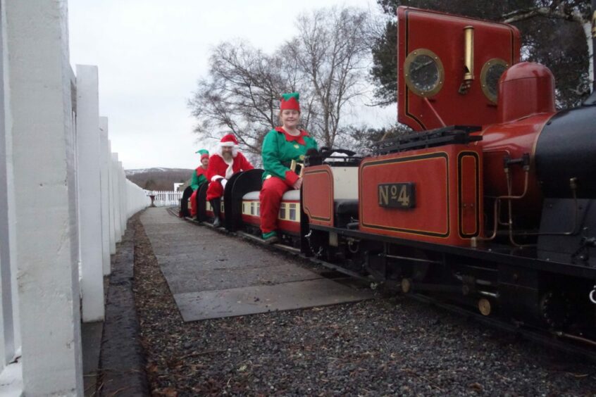 Santa on a miniature train in Grantown on Spey, Highlands.