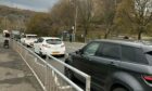 Hundreds of people were late for work and school in Oban this morning due to an 'inefficient and delayed' temporary traffic lights system.