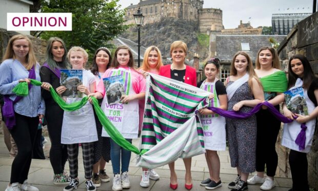First Minister Nicola Sturgeon poses with young women in Edinburgh during 2019, to mark the unveiling of a commemorative plaque honouring Suffragette Bessie Watson (Image: Jane Barlow/PA)
