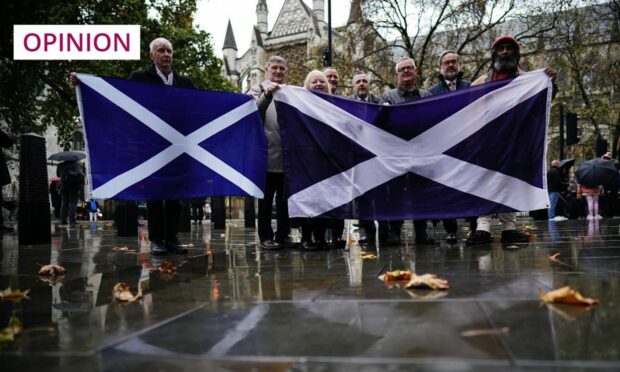 Pro-independence supporters await the decision outside the Supreme Court (Image: Aaron Chown/PA)