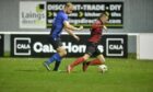 Huntly's Ross Still, left, battles with Inverurie's Greg Mitchell