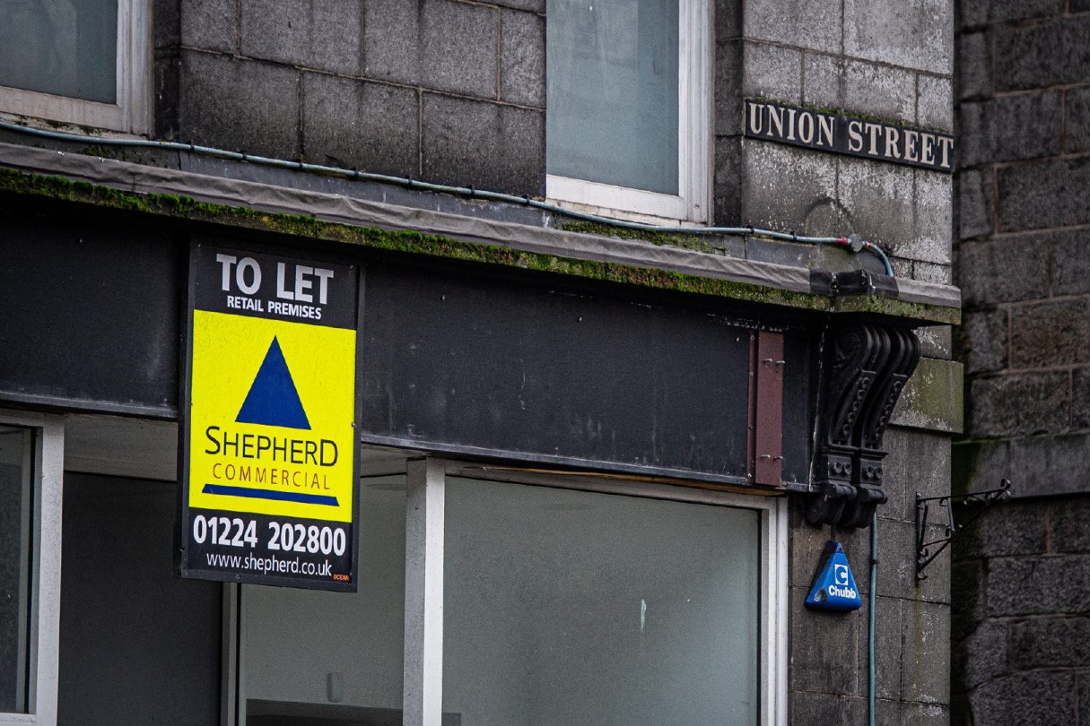 Another vacant unit on Union Street with a 'To Let' sign.
