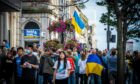 Ukrainians gathered in St Nicholas Street in Aberdeen to celebrate their national independence day in August. Councillors have now clashed over how to pay the cost of hundreds of children suddenly needing school places as a result of the refugee programme. Image: Wullie Marr/DC Thomson.