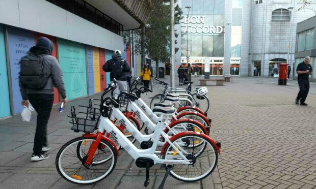 The Big Issue eBike scheme has been rolled out in Aberdeen in locations across the city, including here on George Street. Image: Kieran Beattie/DC Thomson.