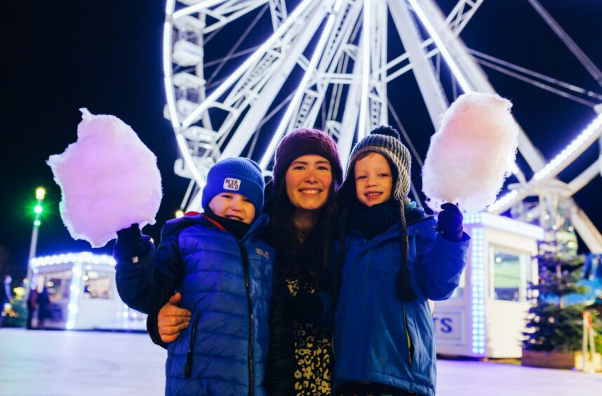 A family visiting Dundee Winterfest.