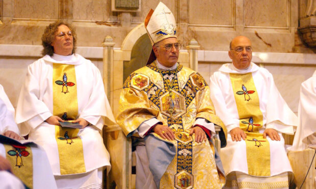 The Most Reverend Mario Joseph Conti (centre) at the mass to mark his installation as Archbishop of Glasgow (Roger Donovan/PA)