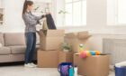 Woman cleaning up before selling property.