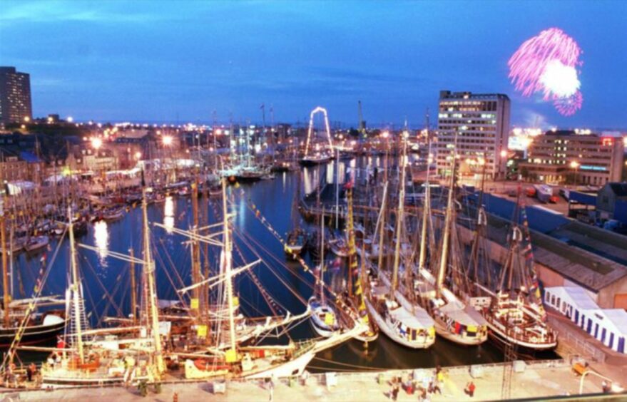 The 1997 Tall Ships Race in Aberdeen with a fireworks display over the harbour.