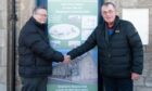 Green Hive has taken over Nairn Seaman's Victoria Hall in a community asset transfer. Simon Nobel, chairman of Green Hive with Ninian Coggs, convenor, of the Seaman?s Hall Image: Hemsworth Images.