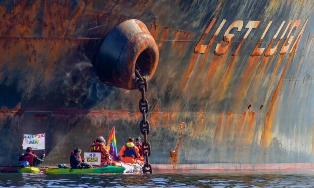 Greenpeace protestors take action against the crude oil tanker 'Ust Luga' in Asgardstrand, Norway.