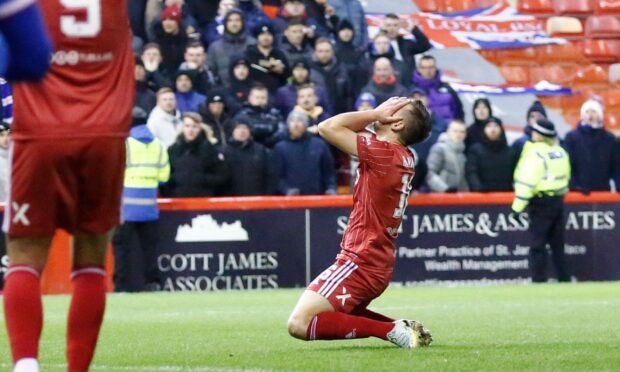 Ylber Ramadani shows his frustration after missing a chance against Rangers. Image: Shutterstock.